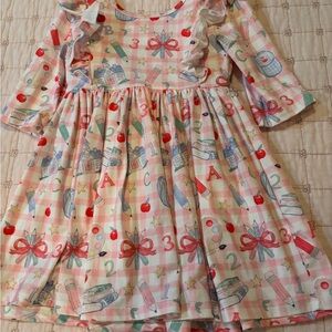 Charming Pink Kids Dress with Playful Print